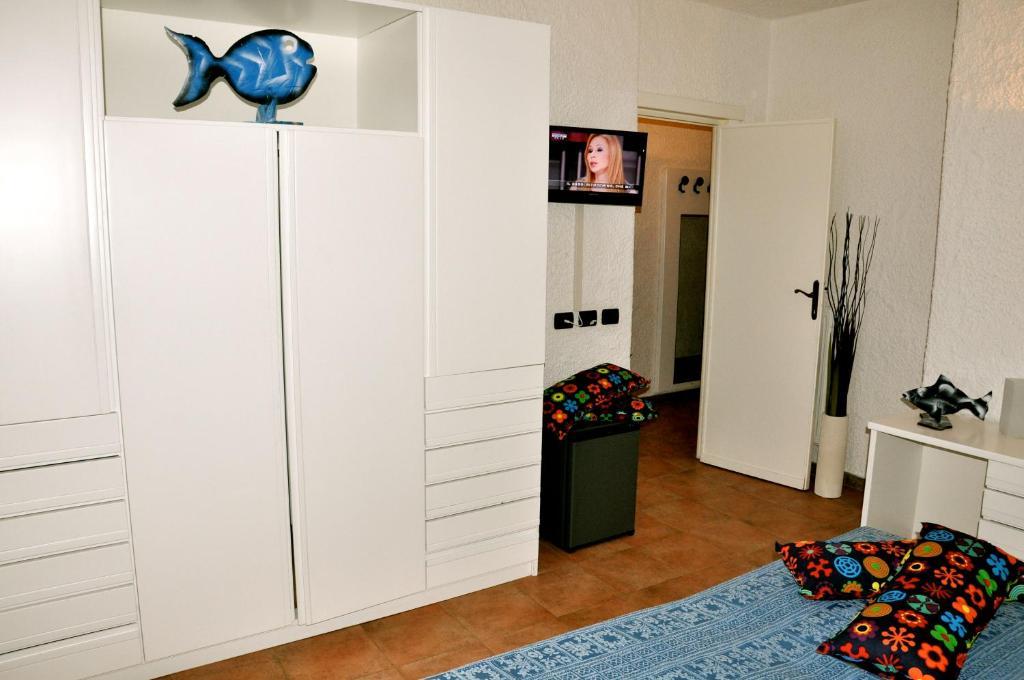 Club Esse Cala Bitta Hotel Baja Sardinia Bilik gambar